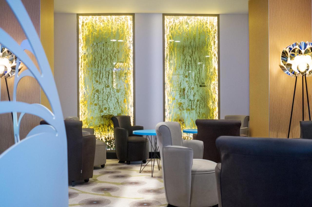 Kyriad Prestige Amiens Poulainville - Hotel And Spa מראה חיצוני תמונה